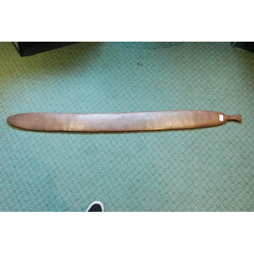 214 - Aboriginal fish tail paddle club (Rainforest sword), with shaped grip, 147.5cm long and 13.5cm wide.