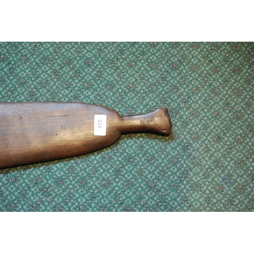 214 - Aboriginal fish tail paddle club (Rainforest sword), with shaped grip, 147.5cm long and 13.5cm wide.