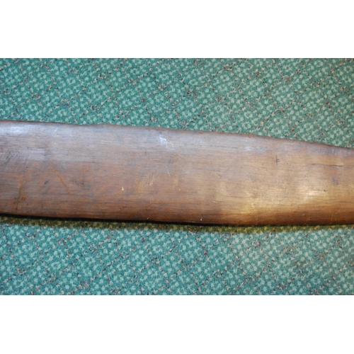 214 - Aboriginal fish tail paddle club (Rainforest sword), with shaped grip, 147.5cm long and 13.5cm wide.