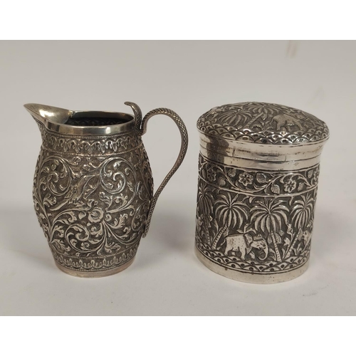 108 - Indian embossed silver cream jug, with serpent handle and a similar jar and cover, 198g / 6oz.