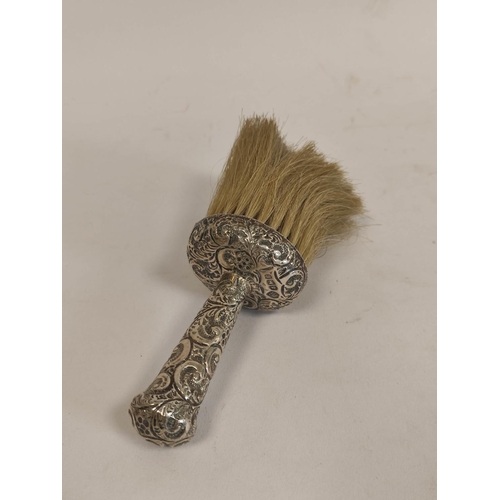 111 - Embossed silver crumb scoop, Birmingham 1907. 