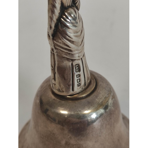 112 - Table bell with silver handle modelled as a Medieval saint by Levi & Salaman, Birmingham 1905. 7... 