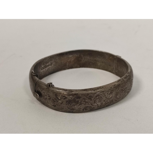 115 - Silver hinged bangle, a similar pendant and various other items.  