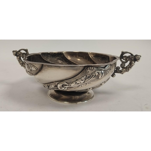 98 - Hemespherical silver bowl of Dutch style, spirally fluted and embossed with figure handles by C S Ha... 