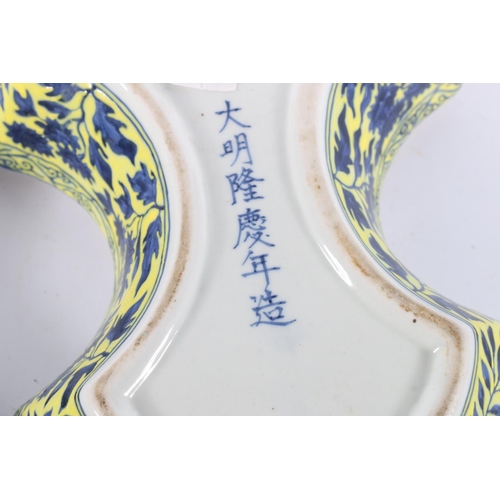 112 - Chinese pottery dish and cover of bone shape decorated with kylin chasing flaming pearl, Lung Ching ... 