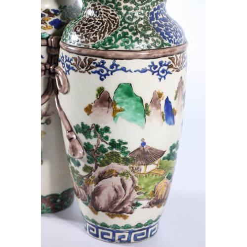 119 - Chinese Famille Verte pottery double vase decorated with parrot, red four character mark to the base... 