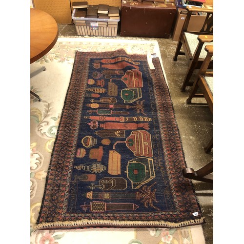 467 - Eastern blue ground woolen rug/carpet 187cm x 102cm