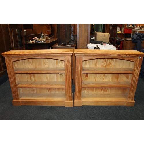 468 - Pair of pine open fronted, three shelf bookcases, raised on plinth style bases, wach 106 x 92cm.