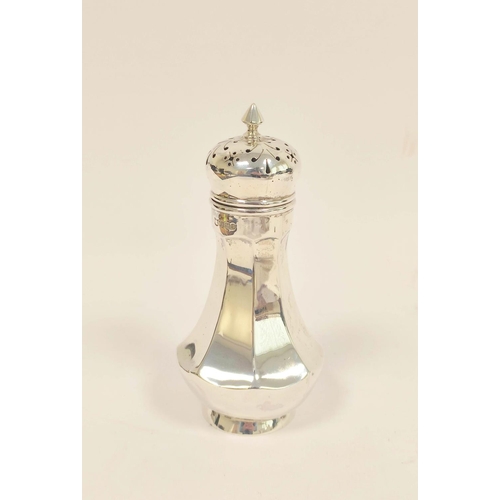 122 - George V silver sugar castor of faceted form, Sheffield 1911, 17.5cm high, 173g.