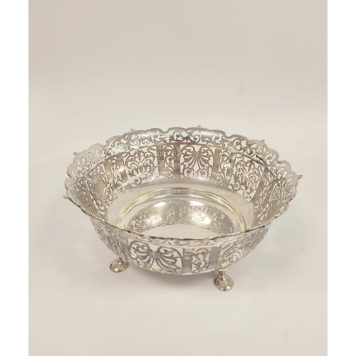 123 - George V pierced silver fruit bowl, circular form raised on four pad feet, diameter 25cm, London 191... 