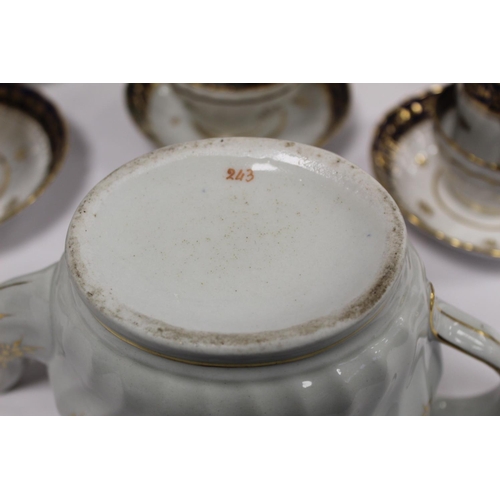 301 - Late 18th/early 19th century New Hall English porcelain tea set, pattern no. 243, with twist fluting... 