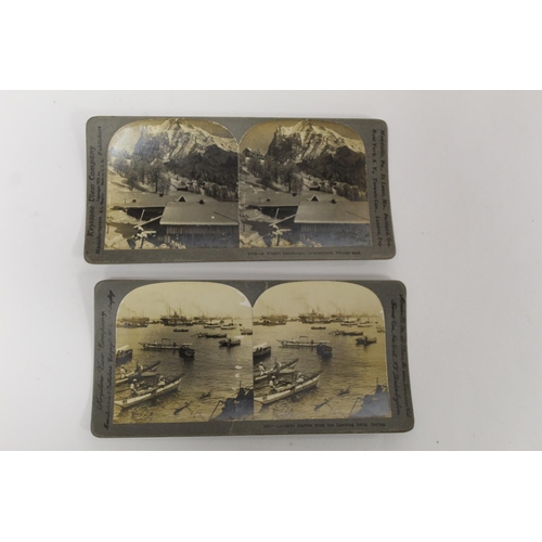 302 - Two hand held stereoscopic viewers; a small collection of stereoscopic views by Keystone View Compan... 