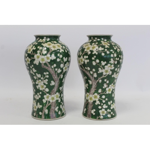 315 - Pair of late 19th/early 20th century Japanese vases of meiping form decorated with prunus blossom on... 