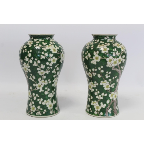 315 - Pair of late 19th/early 20th century Japanese vases of meiping form decorated with prunus blossom on... 