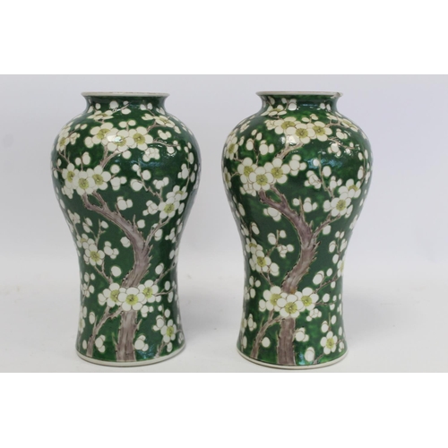 315 - Pair of late 19th/early 20th century Japanese vases of meiping form decorated with prunus blossom on... 