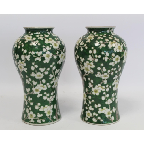 315 - Pair of late 19th/early 20th century Japanese vases of meiping form decorated with prunus blossom on... 