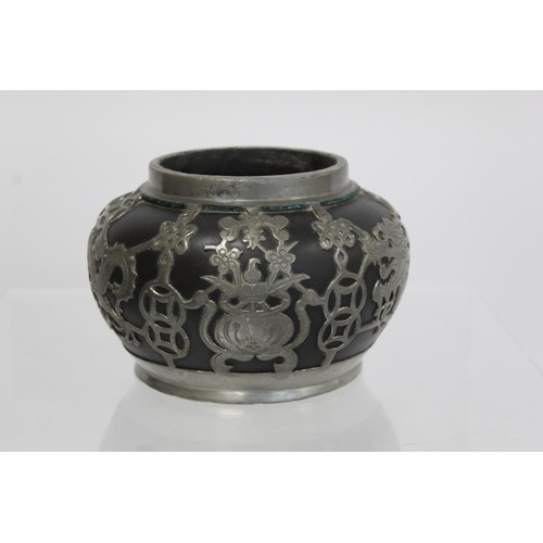 316 - Late 19th/early 20th century Chinese black stoneware squat circular vase with applied pewter decorat... 