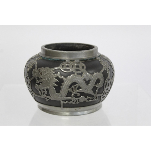 316 - Late 19th/early 20th century Chinese black stoneware squat circular vase with applied pewter decorat... 