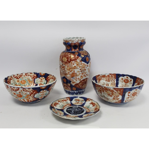 317 - Four pieces of late 19th century Japanese Imari porcelain comprising: ribbed baluster vase decorated... 