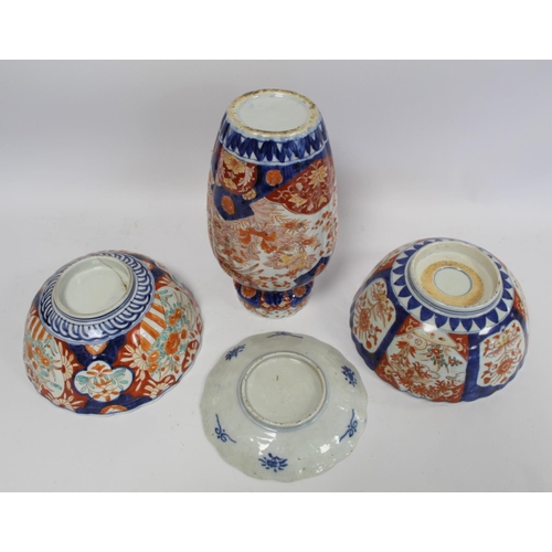 317 - Four pieces of late 19th century Japanese Imari porcelain comprising: ribbed baluster vase decorated... 