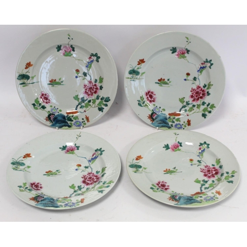 318 - Set of four 18th century Chinese porcelain plates decorated with flowers and rocks in the famille ro... 