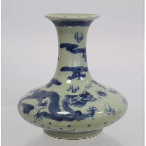 325 - Chinese vase of squat baluster form, the pale celadon ground with underglaze blue decoration of scro... 