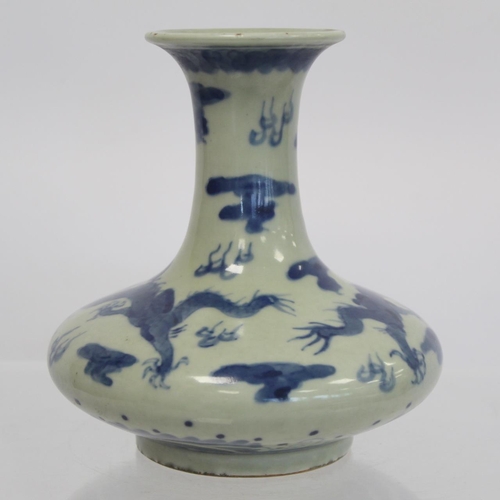 325 - Chinese vase of squat baluster form, the pale celadon ground with underglaze blue decoration of scro... 