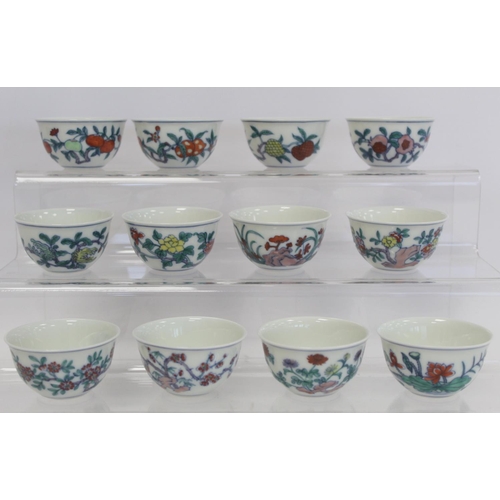 327 - Twelve small Chinese porcelain wine cups decorated with flowers and fruit, each 6cm diam. and 3.5cm ... 