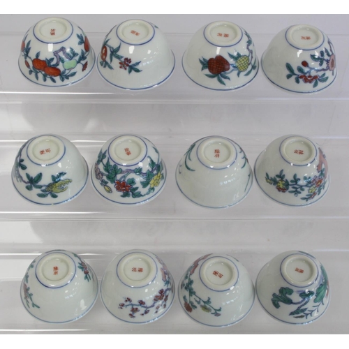 327 - Twelve small Chinese porcelain wine cups decorated with flowers and fruit, each 6cm diam. and 3.5cm ... 