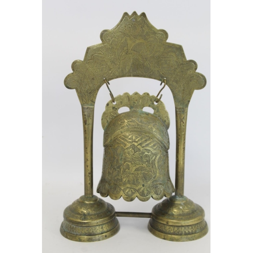 330 - Burmese brass temple bell on stand with incised panels of figures, foliate scroll borders, etc., 57.... 