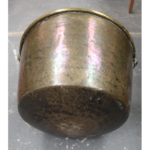 313 - Exceptionally large antique hammered brass cooking pot or kettle of circular bucket form with iron s... 