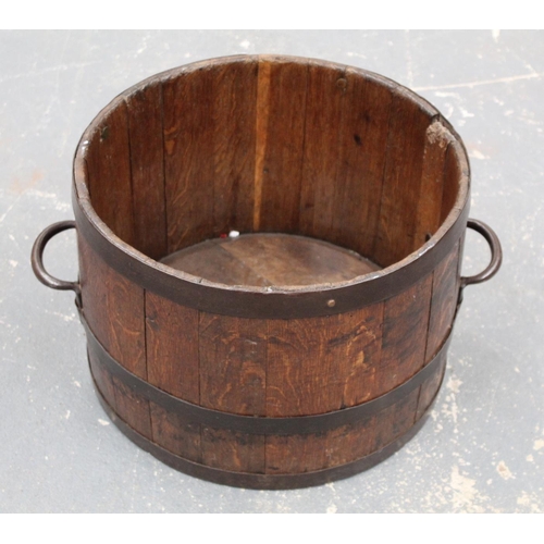 314 - Antique oak planter or log bucket of coopered twin handled barrel form, approx. 62cm wide, 30cm high... 