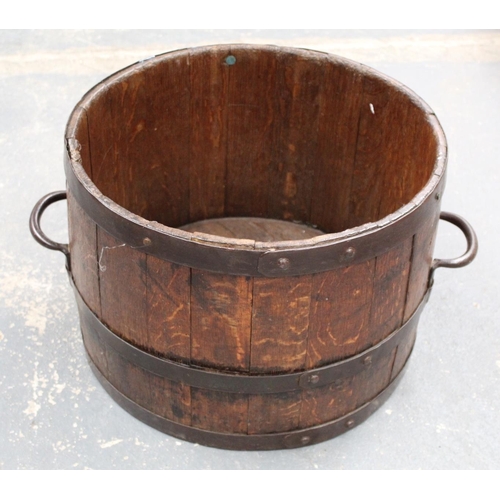 314 - Antique oak planter or log bucket of coopered twin handled barrel form, approx. 62cm wide, 30cm high... 