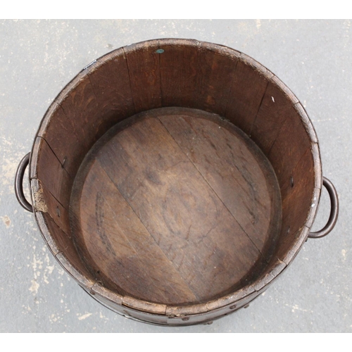 314 - Antique oak planter or log bucket of coopered twin handled barrel form, approx. 62cm wide, 30cm high... 