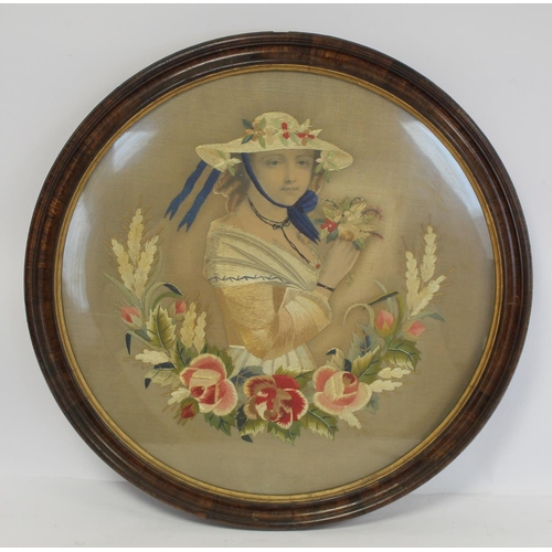 402 - Victorian silk embroidery of a girl holding a posy of flowers with wreath of roses and grasses below... 