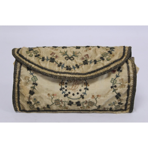 409 - Georgian silk purse of rectangular form, the cream duchess satin with polychrome silk embroidered fo... 