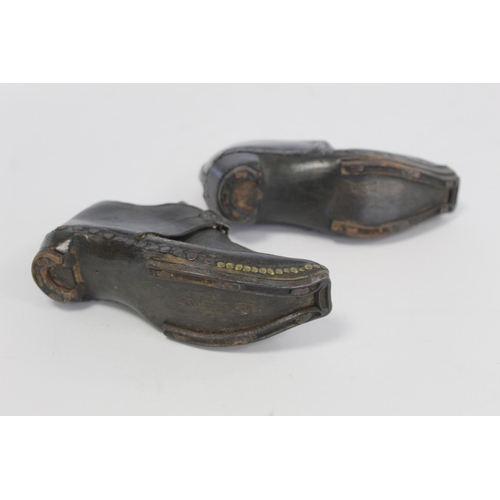 410 - Pair of 19th century child's clogs with metal buckles, riveted detail and steel to sole and heels, e... 