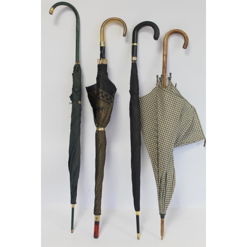 423 - Vintage Italian lady's umbrella; three others and an Oriental parasol.  (5).