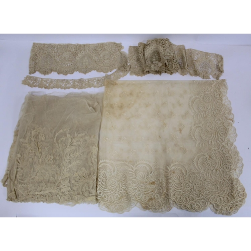 425 - Antique lace veil of square form, approx. 108cm x 108cm and four pieces of lace trim.