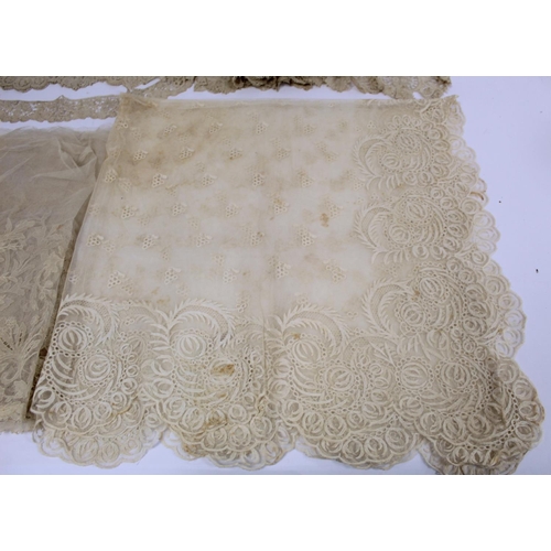 425 - Antique lace veil of square form, approx. 108cm x 108cm and four pieces of lace trim.