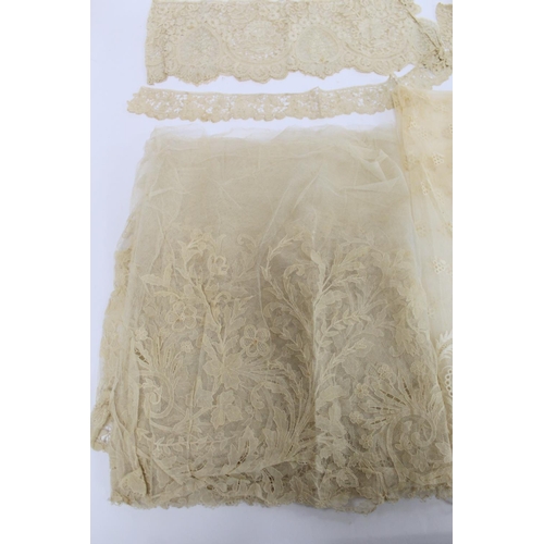 425 - Antique lace veil of square form, approx. 108cm x 108cm and four pieces of lace trim.