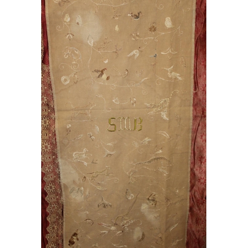 427 - Antique bedspread with three appliqued embroidered panels, the natural scrim fields worked in silk t... 