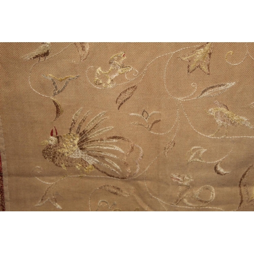 427 - Antique bedspread with three appliqued embroidered panels, the natural scrim fields worked in silk t... 