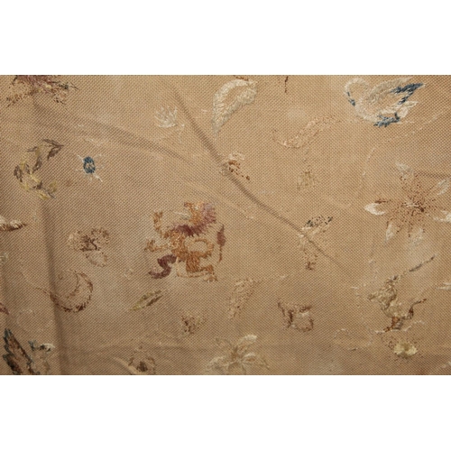 427 - Antique bedspread with three appliqued embroidered panels, the natural scrim fields worked in silk t... 