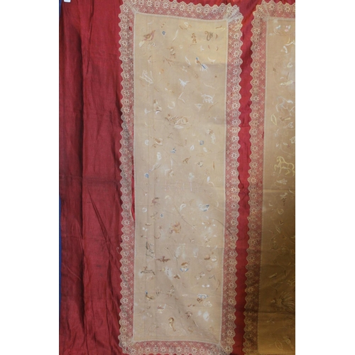 427 - Antique bedspread with three appliqued embroidered panels, the natural scrim fields worked in silk t... 