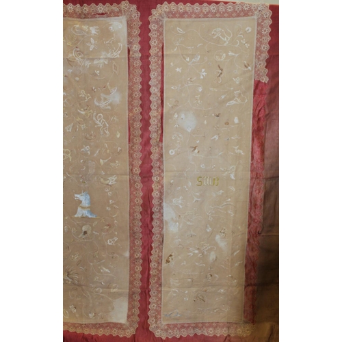 427 - Antique bedspread with three appliqued embroidered panels, the natural scrim fields worked in silk t... 