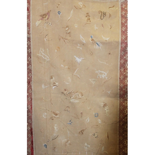 427 - Antique bedspread with three appliqued embroidered panels, the natural scrim fields worked in silk t... 