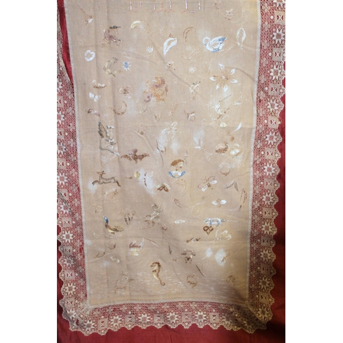 427 - Antique bedspread with three appliqued embroidered panels, the natural scrim fields worked in silk t... 