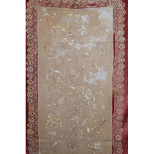 427 - Antique bedspread with three appliqued embroidered panels, the natural scrim fields worked in silk t... 