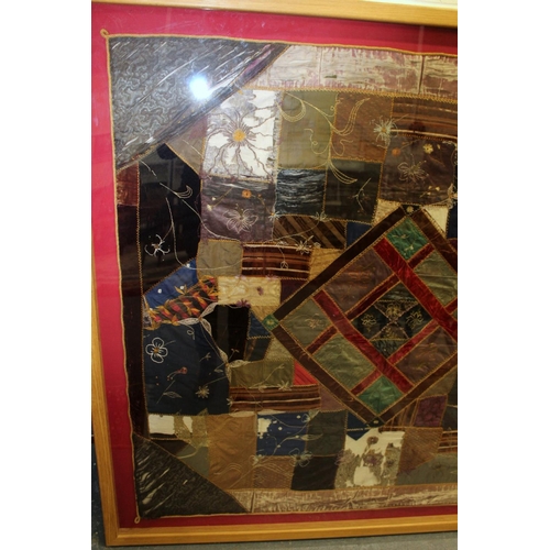 428 - A Victorian 'crazy' pattern patchwork quilt or panel with central diamond lozenge, in polychrome cot... 